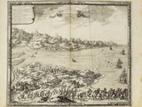 un vieux livre sur lequel figure le dessin d'une ville et d'une rivière