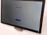 the screen of a tablet computer is displaying a message on it