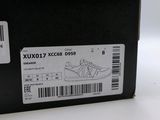 an image of a box with a pair of shoes inside of it