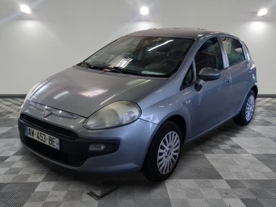 a picture of a small car parked in a garage