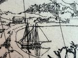 a black and white drawing of a boat on a map