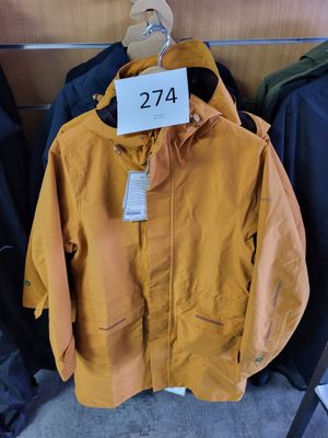 a coat hanging on a hanger in a clothing store
