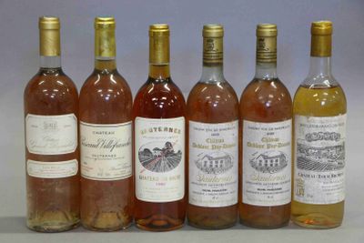 six bouteilles de vin posées les unes à côté des autres sur une table