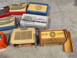 a lot of old radio ' s that are on the ground