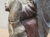 a statue of a woman holding a baby in her arms