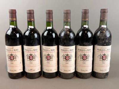 six bottles of wine are lined up in a row on a table