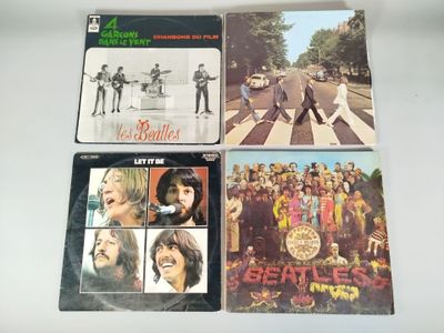 four beatles albums, including the beatles album, and the beatles album