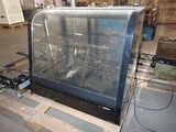 an image of a glass display case on a pallet