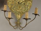 a wall light that is hanging on the wall