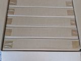 several cardboard boxes stacked on top of each other on the floor
