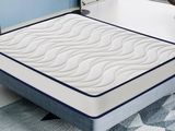 a mattress that is sitting on a table in a room