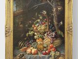 painting of a still life of fruits and vegetables in a gilded frame