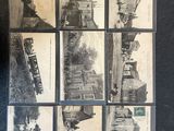 a lot of old postcards that are on the table