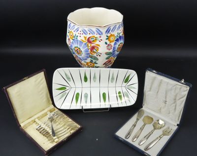 three different types of silverware in a case