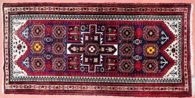 a close up of a rug on a pink background