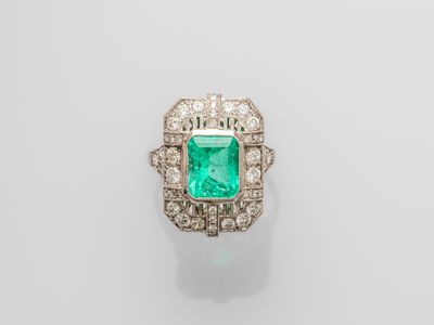 an emerald and diamond ring