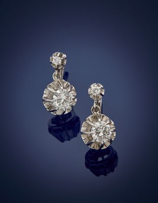 a pair of diamond earrings