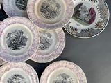 a pile of plates that have different designs on them