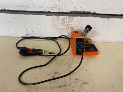 a cord connected to an electrical device on the floor