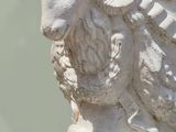 a statue of a man with a beard on a pedestal
