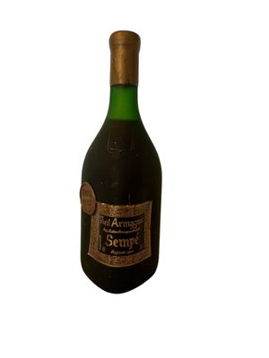 a bottle of wine that is sitting on a table
