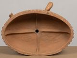 a clay object that is sitting on a table