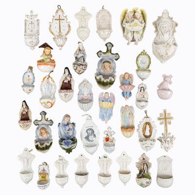 many different types of religious figurines displayed on a white background