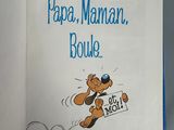 an open book with a picture of a dog holding a sign that says papa, maman, boul