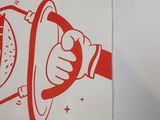 a picture of a picture of a hand holding a donut