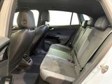 the back seats of a white car are clean and ready to be used