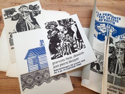 many different types of postcards on the table