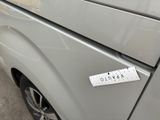 a sticker on the side of a car that says admino