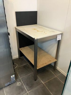 a small table in the corner of a room