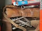many tools in a toolbox that are sitting on a table