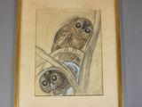 tableau représentant deux chouettes perchées sur une branche, dans un cadre doré