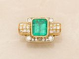 an emerald and diamond ring
