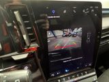 a picture of a car ' s dashboard with a camera mounted on it