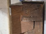 a close up of a piece of wood with a hole in it