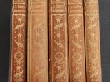 un lot de cinq livres anciens ornés de dorures