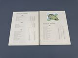 un livre sur lequel figure une liste d'animaux