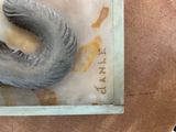 a picture of an elephant ' s head on a table