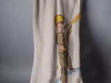 a dress with a picture of a man holding a baseball bat