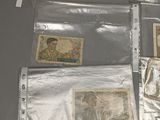 many different types of stamps on the table