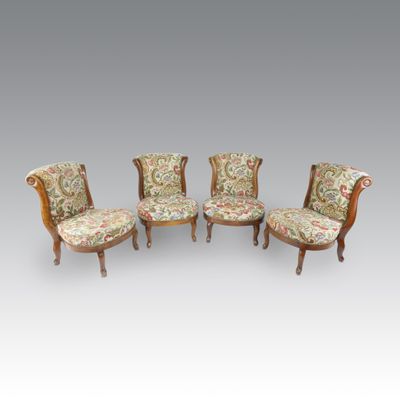 a set of four chairs with floral upholstered upholstered upholstered upholstered uphol