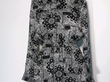 a black and white shirt dress with a black and white pattern