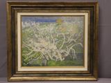 un tableau représentant un pommier en fleurs blanches, dans un cadre doré