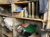 a shelf with many items on it in a room