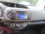 a dashboard of a car with a digital display on it