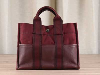 HERMES Paris Sac Toto petit modèle en toile et cuir bordeaux… - Photo 1