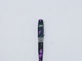 an image of a pen laying on top of a white surface